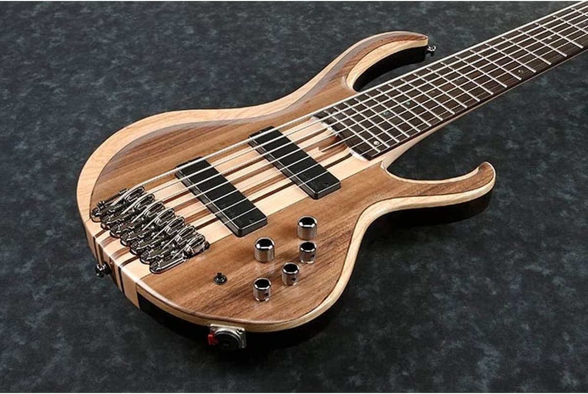 Ibanez BTB747 7 string Electric Bass Guitar with Mahogany-backed Ash Wings, Walnut Top2 Humbucking Pickups and 3-band Active EQ - Natural Flat Low Gloss