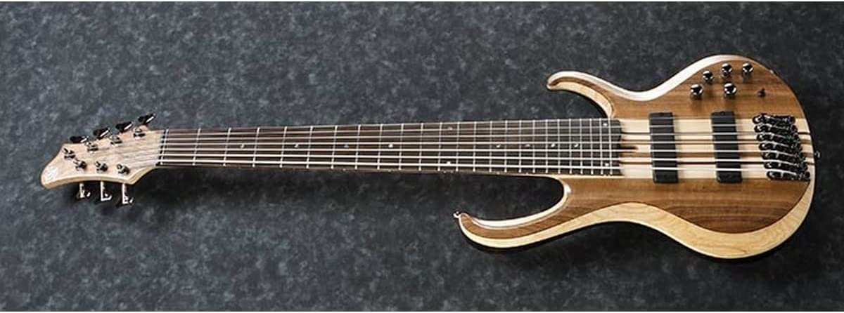 Ibanez BTB747 7 string Electric Bass Guitar with Mahogany-backed Ash Wings, Walnut Top2 Humbucking Pickups and 3-band Active EQ - Natural Flat Low Gloss