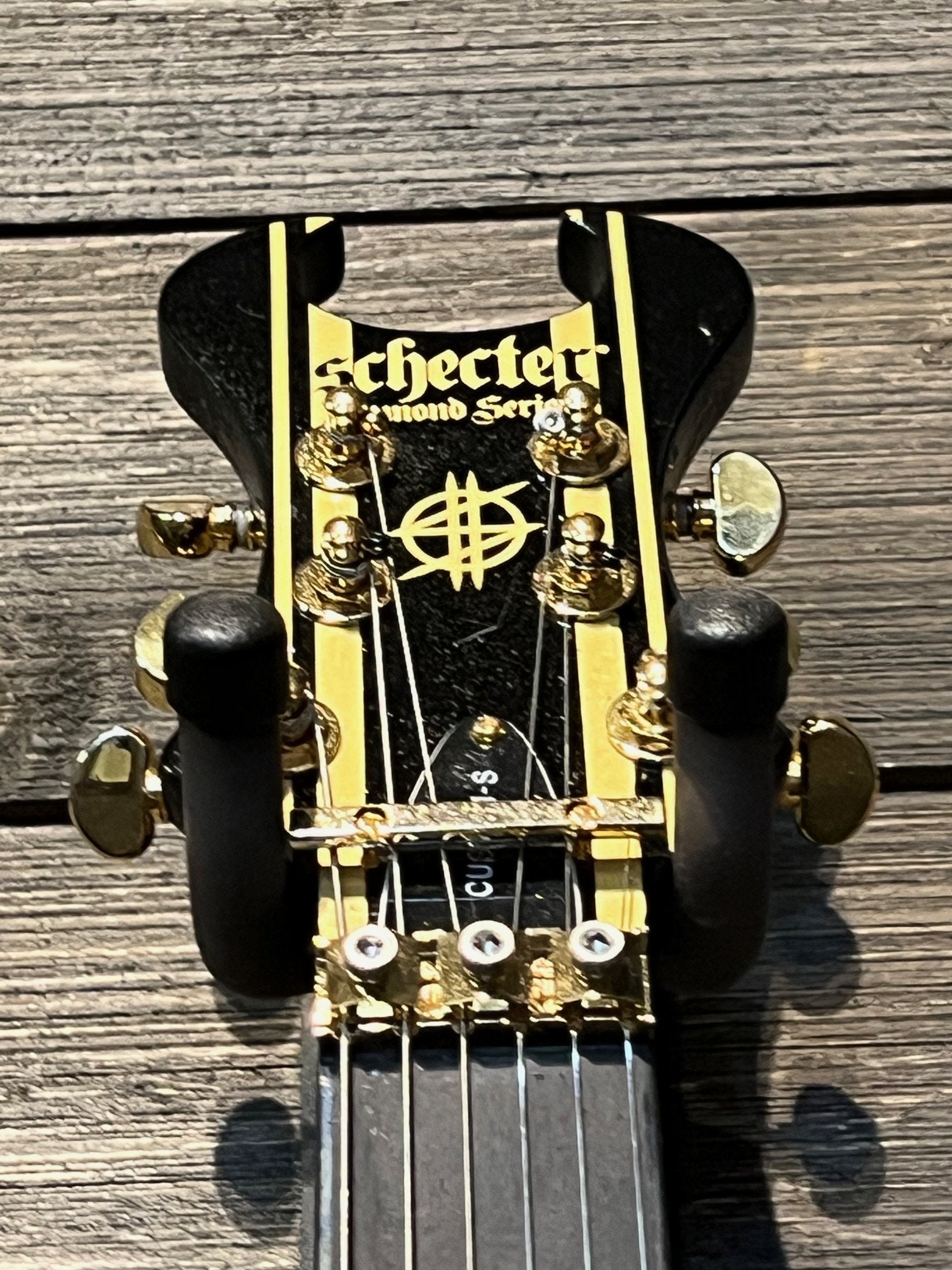 Schecter Synyster Gates Custom-S - Black with Gold Stripes
